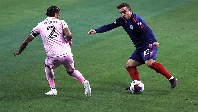 Oct 4, 2023; Chicago, Illinois, USA; Chicago Fire midfielder Xherdan Shaqiri (10) controls the ball during the first half while defended by Inter Miami CF defender DeAndre Yedlin (2) at Soldier Field. Mandatory Credit: Jon Durr-USA TODAY Sports
