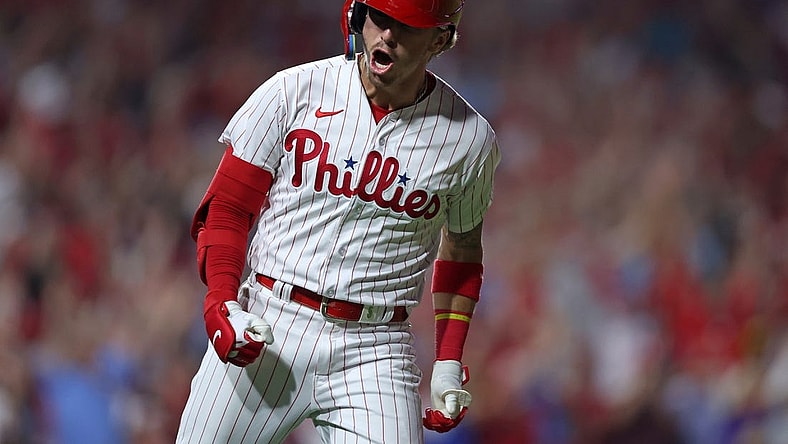 Oct 4, 2023; Philadelphia, Pennsylvania, USA; Philadelphia Phillies second baseman Bryson Stott (5) reacts after hitting  a grand slam against the Miami Marlins during the sixth inning for game two of the Wildcard series for the 2023 MLB playoffs at Citizens Bank Park. Mandatory Credit: Bill Streicher-USA TODAY Sports