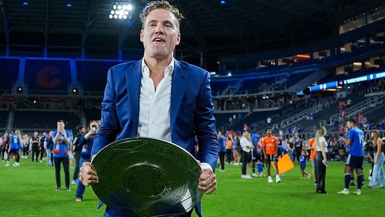 Oct 4, 2023; Cincinnati, Ohio, USA; FC Cincinnati general manager Chris Albright celebrates with the Supporters Shield at TQL Stadium. Mandatory Credit: Aaron Doster-USA TODAY Sports
