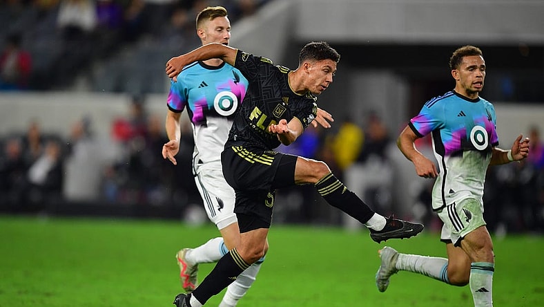 Oct 4, 2023; Los Angeles, California, USA; Los Angeles FC midfielder Filip Yavorov Krastev (50) moves in for a shot on goal against Minnesota United during the second half at BMO Stadium. Mandatory Credit: Gary A. Vasquez-USA TODAY Sports