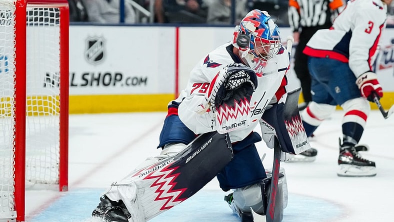 Oct 5, 2023; Columbus, Ohio, USA;  Washington Capitals goaltender Charlie Lindgren (79) attempts a save against the Columbus Blue Jackets in the second period at Nationwide Arena. Mandatory Credit: Aaron Doster-USA TODAY Sports
