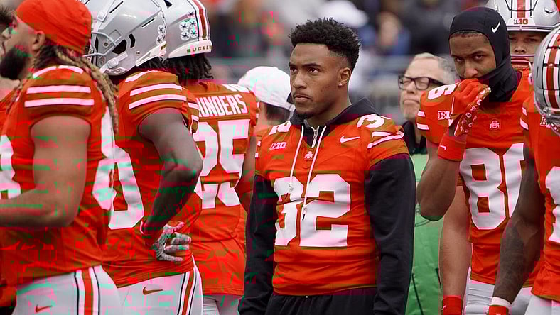 Ohio State running back TreVeyon Henderson watches warmups before the Buckeyes game against Maryland at Ohio Stadium on Oct. 7, 2023.