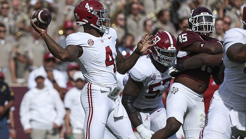 Oct 7, 2023; College Station, Texas, USA; Alabama Crimson Tide quarterback Jalen Milroe (4) attempts a pass during the second quarter against the Texas A&M Aggies at Kyle Field. Mandatory Credit: Troy Taormina-USA TODAY Sports