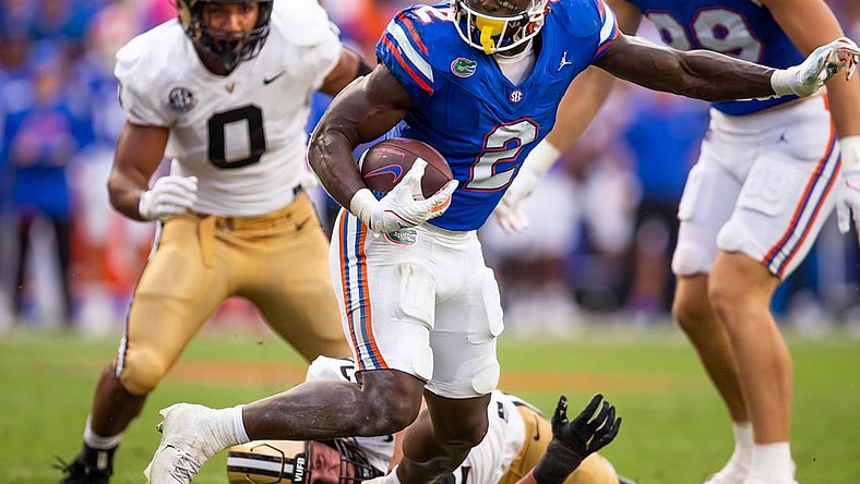 Florida Gators running back Montrell Johnson Jr. (2) drives to the end zone in the first half against Vanderbilt at Steve Spurrier Field at Ben Hill Griffin Stadium in Gainesville, FL on Saturday, October 7, 2023. [Doug Engle/Gainesville Sun]