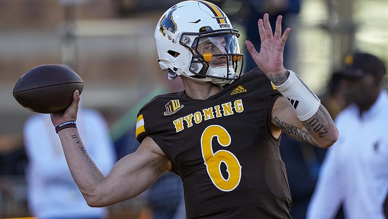 Oct 7, 2023; Laramie, Wyoming, USA; Wyoming Cowboys quarterback Andrew Peasley (6) warms up before game against the Fresno State Bulldogs at Jonah Field at War Memorial Stadium. Mandatory Credit: Troy Babbitt-USA TODAY Sports