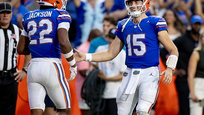 Florida Gators quarterback Graham Mertz (15) and Florida Gators wide receiver Kahleil Jackson (22) celebrate after a touchdown during the second half against the Vanderbilt Commodores at Steve Spurrier Field at Ben Hill Griffin Stadium in Gainesville, FL on Saturday, October 7, 2023. [Matt Pendleton/Gainesville Sun]