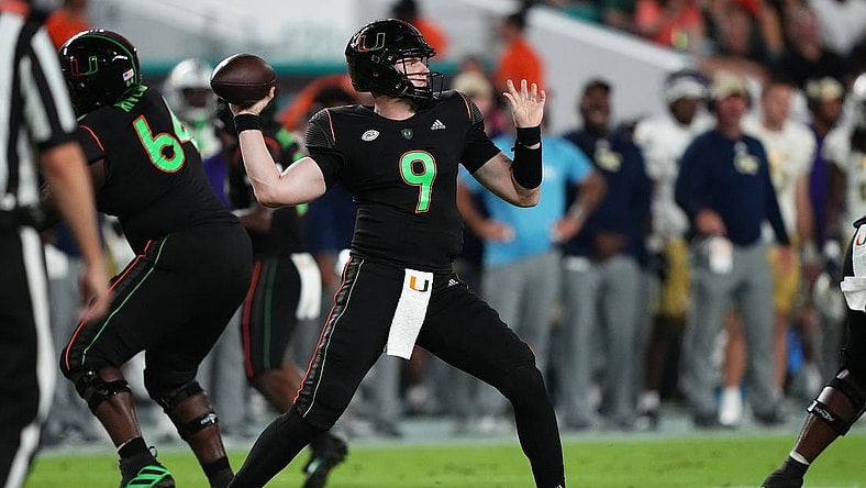Oct 7, 2023; Miami Gardens, Florida, USA; Miami Hurricanes quarterback Tyler Van Dyke (9) attempts a pass against the Georgia Tech Yellow Jackets in the first half at Hard Rock Stadium. Mandatory Credit: Jasen Vinlove-USA TODAY Sports