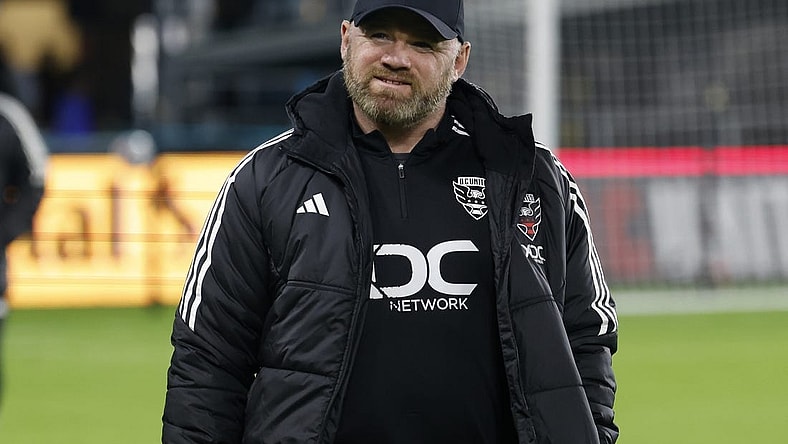 Oct 7, 2023; Washington, District of Columbia, USA; D.C. United head coach Wayne Rooney walks onto the pitch prior to the match against New York City FC at Audi Field. Mandatory Credit: Geoff Burke-USA TODAY Sports