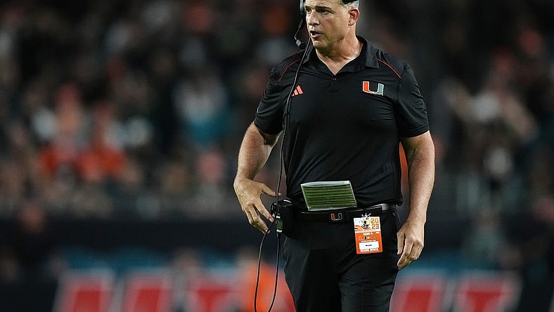 Oct 7, 2023; Miami Gardens, Florida, USA; Miami Hurricanes head coach Mario Cristobal walks on the field in the second half against the Georgia Tech Yellow Jackets at Hard Rock Stadium. Mandatory Credit: Jasen Vinlove-USA TODAY Sports