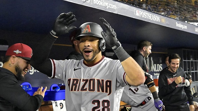 Oct 7, 2023; Los Angeles, California, USA; Arizona Diamondbacks left fielder Tommy Pham (28) reacts in the dug out against the Los Angeles Dodgers during the eighth inning for game one of the NLDS for the 2023 MLB playoffs at Dodger Stadium. Mandatory Credit: Jayne Kamin-Oncea-USA TODAY Sports