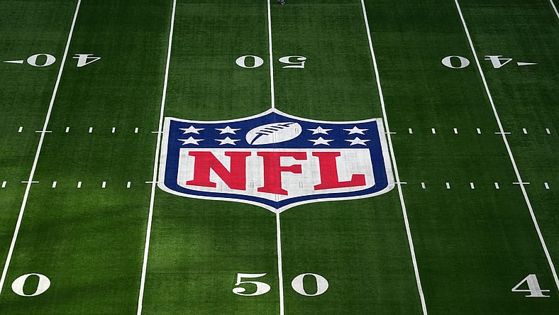Oct 8, 2023; London United Kingdom, The NFL Shield logo at midfield at Tottenham Hotspur Stadium. Mandatory Credit: Kirby Lee-USA TODAY Sports