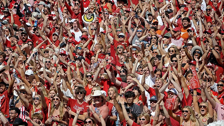 Oklahoma fans cheer during the Red River Rivalry college football game between the University of Oklahoma Sooners (OU) and the University of Texas (UT) Longhorns at the Cotton Bowl in Dallas, Saturday, Oct. 7, 2023. Oklahoma won 34-30.