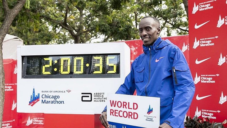 Oct 8, 2023; Chicago, IL, USA; Kelvin Kiptum (KEN) celebrates after finishing in a world record time of 2:00:35 to win the Chicago Marathon at Grant Park. Mandatory Credit: Patrick Gorski-USA TODAY Sports