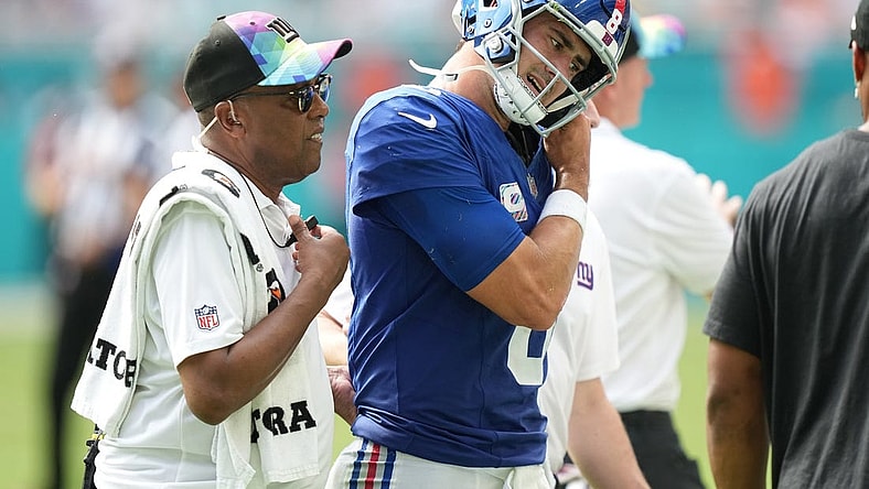 New York Giants quarterback Daniel Jones (8) leaves the game with an injury against the Miami Dolphins during the second half of an NFL game at Hard Rock Stadium in Miami Gardens, October 8, 2023.