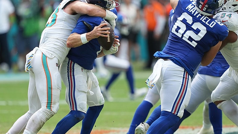 Miami Dolphins linebacker Andrew Van Ginkel (43) sacks New York Giants quarterback Daniel Jones (8) during the second half of an NFL game at Hard Rock Stadium in Miami Gardens, October 8, 2023.
