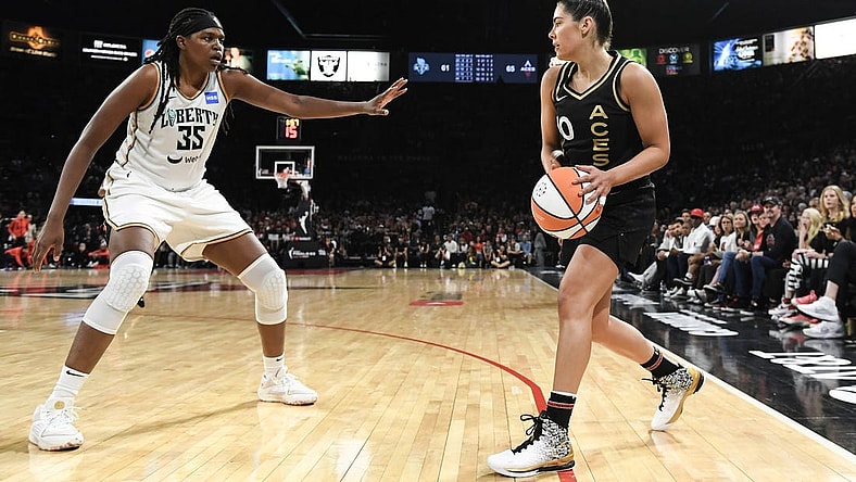 Oct 8, 2023; Las Vegas, Nevada, USA; New York Liberty forward Jonquel Jones (35) defends against Las Vegas Aces guard Kelsey Plum (10) in the second half during game one of the 2023 WNBA Finals at Michelob Ultra Arena. Mandatory Credit: Candice Ward-USA TODAY Sports