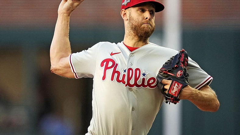 Oct 9, 2023; Cumberland, Georgia, USA; Philadelphia Phillies starting pitcher Zack Wheeler (45) pitches during the first inning against the Atlanta Braves in game two of the NLDS for the 2023 MLB playoffs at Truist Park. Mandatory Credit: Dale Zanine-USA TODAY Sports
