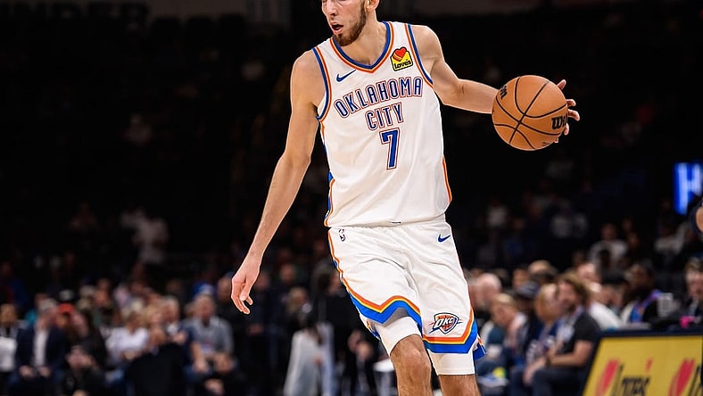 Oct 9, 2023; Oklahoma City, Oklahoma, USA; Oklahoma City Thunder forward Chet Holmgren (7) dribbles the ball during the game against the San Antonio Spurs at Paycom Center. Mandatory Credit: Rob Ferguson-USA TODAY Sports