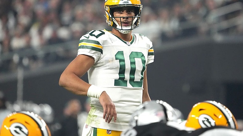 Oct 9, 2023; Paradise, Nevada, USA; Green Bay Packers quarterback Jordan Love (10) prepares to take the snap against the Las Vegas Raiders in the second half at Allegiant Stadium. Mandatory Credit: Kirby Lee-USA TODAY Sports