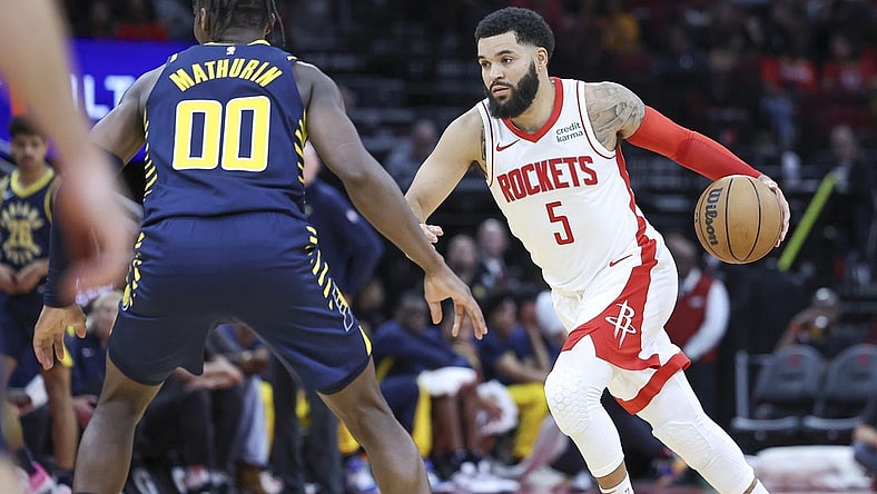 Oct 10, 2023; Houston, Texas, USA; Houston Rockets guard Fred VanVleet (5) dribbles the ball as Indiana Pacers guard Bennedict Mathurin (00) defends during the second quarter at Toyota Center. Mandatory Credit: Troy Taormina-USA TODAY Sports