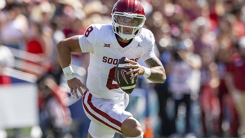 Oct 7, 2023; Dallas, Texas, USA; Oklahoma Sooners quarterback Dillon Gabriel (8) in action during the game between the Texas Longhorns and the Oklahoma Sooners at the Cotton Bowl. Mandatory Credit: Jerome Miron-USA TODAY Sports