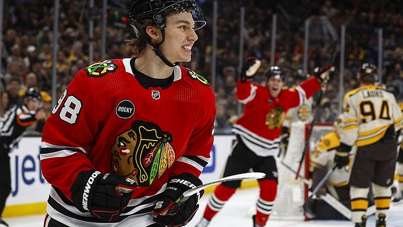 Oct 11, 2023; Boston, Massachusetts, USA; Chicago Blackhawks center Connor Bedard (98) smiles after scoring his first NHL goal during the first period against the Boston Bruins at TD Garden. Mandatory Credit: Winslow Townson-USA TODAY Sports