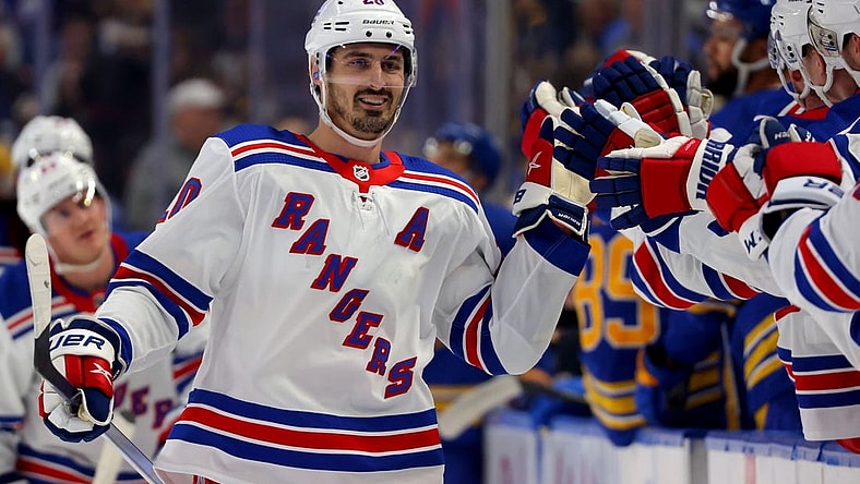 Oct 12, 2023; Buffalo, New York, USA;  New York Rangers left wing Chris Kreider (20) celebrates his goal with teammates during the first period against the Buffalo Sabres at KeyBank Center. Mandatory Credit: Timothy T. Ludwig-USA TODAY Sports