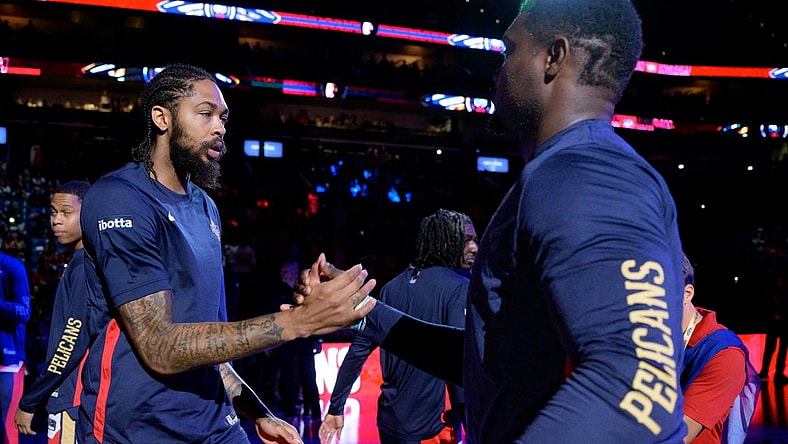 Oct 10, 2023; New Orleans, Louisiana, USA; New Orleans Pelicans forward Brandon Ingram, left, greets New Orleans Pelicans forward Zion Williamson during introductions before a game against the Orlando Magic at the Smoothie King Center. Mandatory Credit: Matthew Hinton-USA TODAY Sports