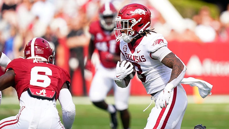 Oct 14, 2023; Tuscaloosa, Alabama, USA; Arkansas Razorbacks tight end Ty Washington (8) runs the ball up the field against the Alabama Crimson Tide during the first quarter at Bryant-Denny Stadium. Mandatory Credit: John David Mercer-USA TODAY Sports