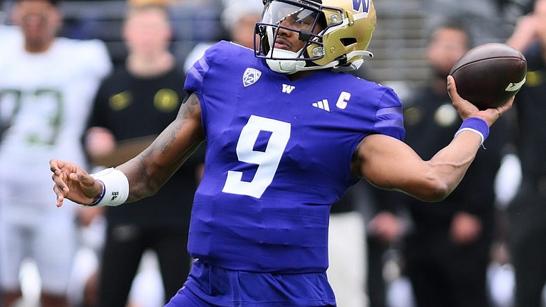 Oct 14, 2023; Seattle, Washington, USA; Washington Huskies quarterback Michael Penix Jr. (9) passes the ball against the Oregon Ducks during the first half at Alaska Airlines Field at Husky Stadium. Mandatory Credit: Steven Bisig-USA TODAY Sports
