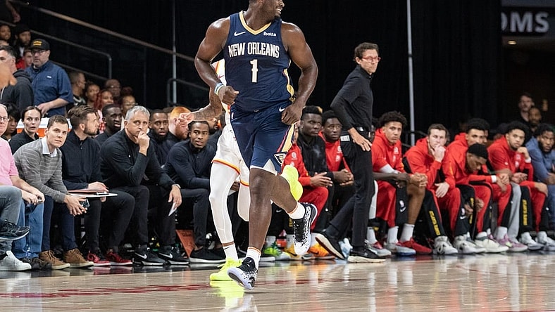 Oct 14, 2023; College Park, Georgia, USA; New Orleans Pelicans forward Zion Williamson (1) runs down court against the Atlanta Hawks during the first quarter at Gateway Center Arena at College Park. Mandatory Credit: Jordan Godfree-USA TODAY Sports