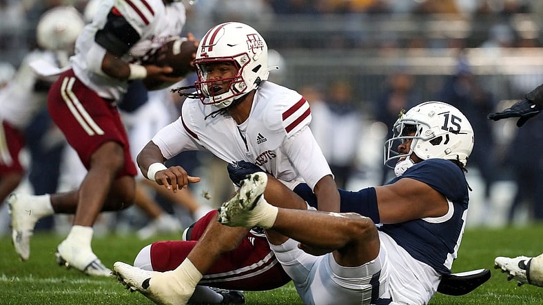Oct 14, 2023; University Park, Pennsylvania, USA; Penn State Nittany Lions defensive end Amin Vanover (15) tackles Massachusetts Minutemen quarterback Taisun Phommachanh (3) in the back field during the first quarter at Beaver Stadium. Mandatory Credit: Matthew O'Haren-USA TODAY Sports