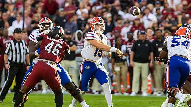 Oct 14, 2023; Columbia, South Carolina, USA; Florida Gators quarterback Graham Mertz (15) throws a pass against the South Carolina Gamecocks in the second quarter at Williams-Brice Stadium. Mandatory Credit: Jeff Blake-USA TODAY Sports