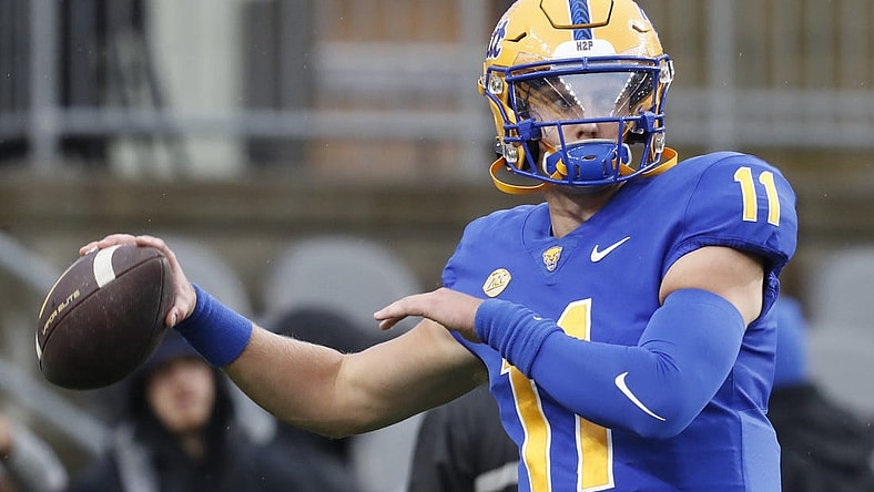 Oct 14, 2023; Pittsburgh, Pennsylvania, USA;  Pittsburgh Panthers quarterback Christian Veilleux (11) warms up before the game against the Louisville Cardinals at Acrisure Stadium. Mandatory Credit: Charles LeClaire-USA TODAY Sports