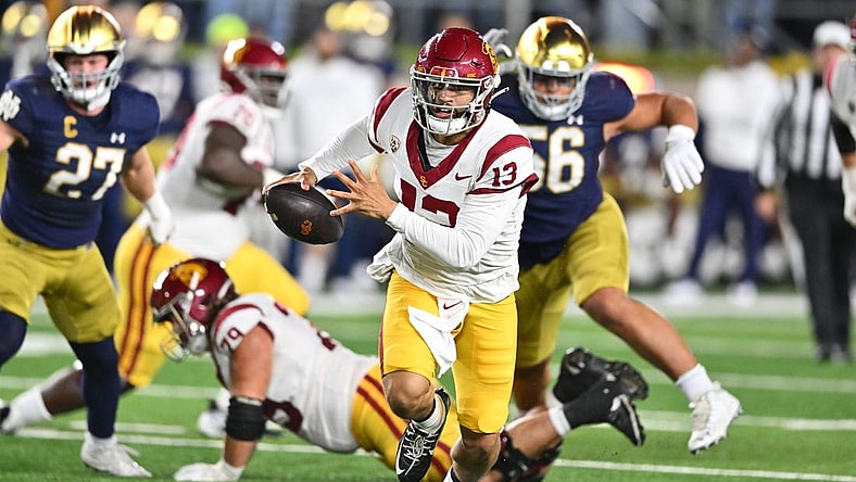 Oct 14, 2023; South Bend, Indiana, USA; USC Trojans quarterback Caleb Williams (13) runs the ball in the second quarter against the Notre Dame Fighting Irish at Notre Dame Stadium. Mandatory Credit: Matt Cashore-USA TODAY Sports