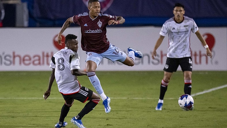 Oct 14, 2023; Frisco, TX, USA; Colorado Rapids forward Calvin Harris (14) leaps over FC Dallas forward Jader Obrian (8) during the first half at Toyota Stadium. Mandatory Credit: Jerome Miron-USA TODAY Sports
