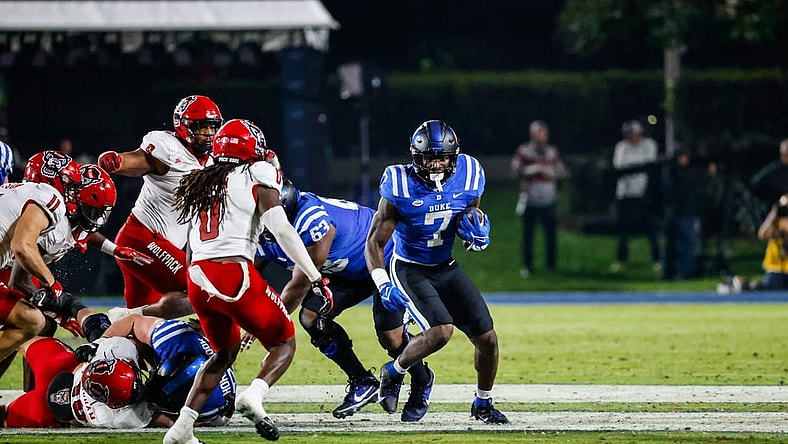 Oct 14, 2023; Durham, North Carolina, USA; Duke Blue Devils running back Jordan Waters (7) runs with the football during the first half of the game against North Carolina State Wolfpack at Wallace Wade Stadium. Mandatory Credit: Jaylynn Nash-USA TODAY Sports