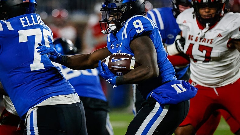 Oct 14, 2023; Durham, North Carolina, USA; Duke Blue Devils running back Jaquez Moore (9) runs with the football during the first half of the game against North Carolina State Wolfpack at Wallace Wade Stadium. Mandatory Credit: Jaylynn Nash-USA TODAY Sports