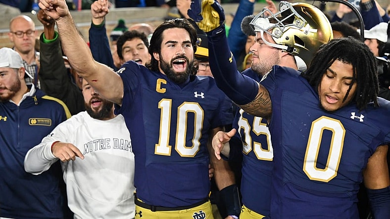 Oct 14, 2023; South Bend, Indiana, USA; Notre Dame Fighting Irish quarterback Sam Hartman (10) celebrates after Notre Dame defeated the USC Trojans at Notre Dame Stadium. Mandatory Credit: Matt Cashore-USA TODAY Sports