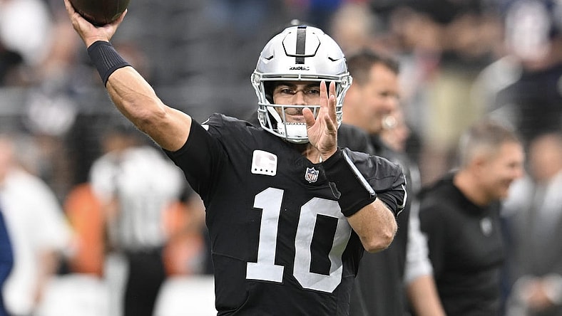 Oct 15, 2023; Paradise, Nevada, USA; Las Vegas Raiders quarterback Jimmy Garoppolo (10) warms up against the New England Patriots at Allegiant Stadium. Mandatory Credit: Candice Ward-USA TODAY Sports
