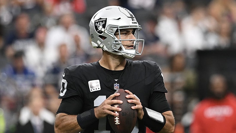 Oct 15, 2023; Paradise, Nevada, USA; Las Vegas Raiders quarterback Jimmy Garoppolo (10) looks to make a pass against the New England Patriots in the first quarter at Allegiant Stadium. Mandatory Credit: Candice Ward-USA TODAY Sports