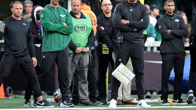 Oct 15, 2023; East Rutherford, New Jersey, USA; New York Jets injured quarterback Aaron Rodgers (left) and head coach Robert Saleh on the sidelines during the first quarter against the Philadelphia Eagles at MetLife Stadium. Mandatory Credit: Brad Penner-USA TODAY Sports
