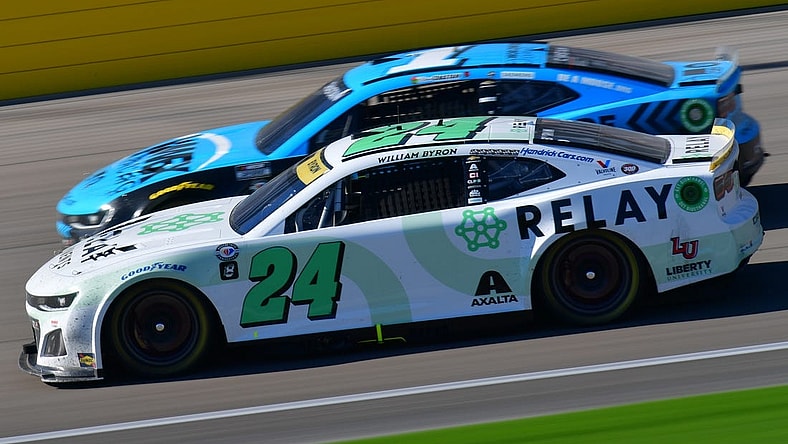 Oct 15, 2023; Las Vegas, Nevada, USA; NASCAR Cup Series driver William Byron (24) drives for position against driver Ross Chastain (1) during the South Point 400 at Las Vegas Motor Speedway. Mandatory Credit: Gary A. Vasquez-USA TODAY Sports