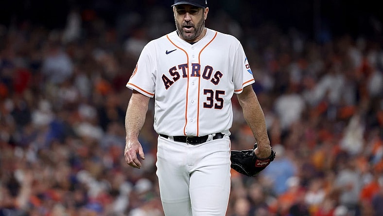 Oct 15, 2023; Houston, Texas, USA; Houston Astros pitcher Justin Verlander (35) reacts after giving up a home run to Texas Rangers center fielder Leody Taveras (not pictured) during the fifth inning of game one of the ALCS in the 2023 MLB playoffs at Minute Maid Park. Mandatory Credit: Troy Taormina-USA TODAY Sports
