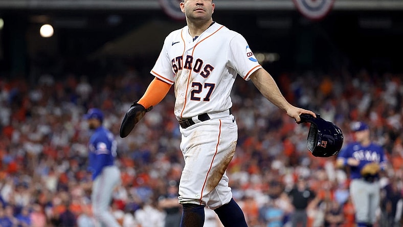 Oct 15, 2023; Houston, Texas, USA; Houston Astros second baseman Jose Altuve (27) reacts after being called out on a review during the eighth inning of game one of the ALCS against the Texas Rangers in the 2023 MLB playoffs at Minute Maid Park. Mandatory Credit: Troy Taormina-USA TODAY Sports