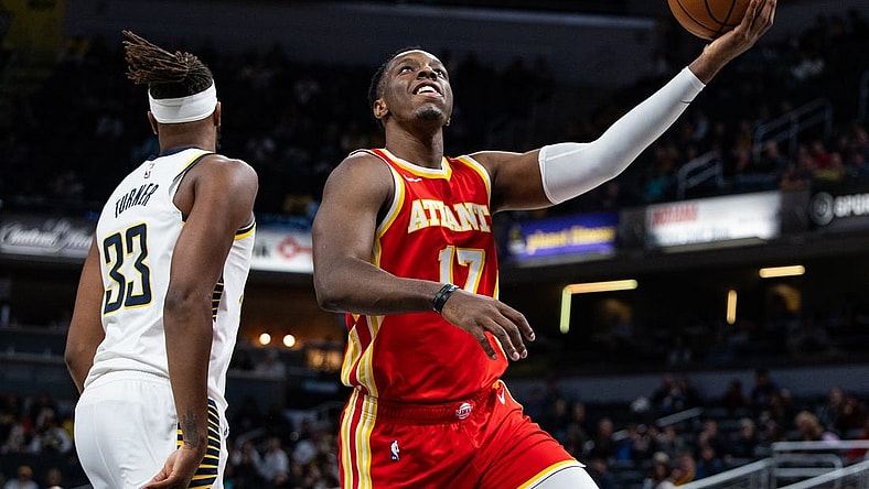 Oct 16, 2023; Indianapolis, Indiana, USA;  Atlanta Hawks forward Onyeka Okongwu (17) shoots the ball while Indiana Pacers center Myles Turner (33) defends in the second quarter at Gainbridge Fieldhouse. Mandatory Credit: Trevor Ruszkowski-USA TODAY Sports
