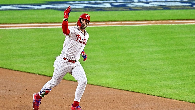 Oct 16, 2023; Philadelphia, Pennsylvania, USA; Philadelphia Phillies first baseman Bryce Harper (3) hits a solo home run during the first inning against the Arizona Diamondbacks in game one of the NLCS for the 2023 MLB playoffs at Citizens Bank Park. Mandatory Credit: Kyle Ross-USA TODAY Sports
