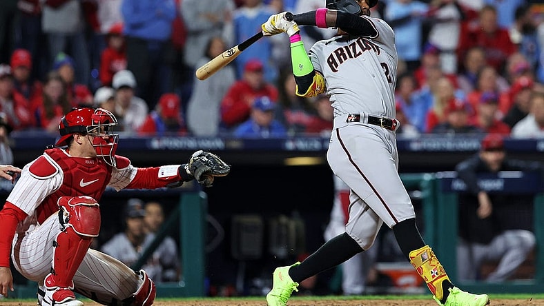 Oct 16, 2023; Philadelphia, Pennsylvania, USA; Arizona Diamondbacks shortstop Geraldo Perdomo (2) hits a two run home run during the sixth inning against the Philadelphia Phillies in game one of the NLCS for the 2023 MLB playoffs at Citizens Bank Park. Mandatory Credit: Bill Streicher-USA TODAY Sports