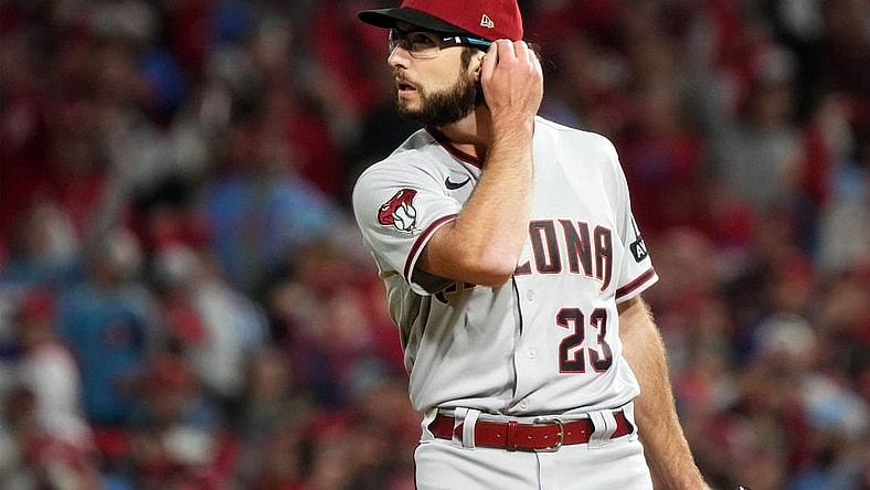 Arizona Diamondbacks starting pitcher Zac Gallen (23) reacts after giving up a solo home run to the Philadelphia Phillies in the second inning during Game 1 of the NLCS at Citizens Bank Park in Philadelphia on Oct. 16, 2023.