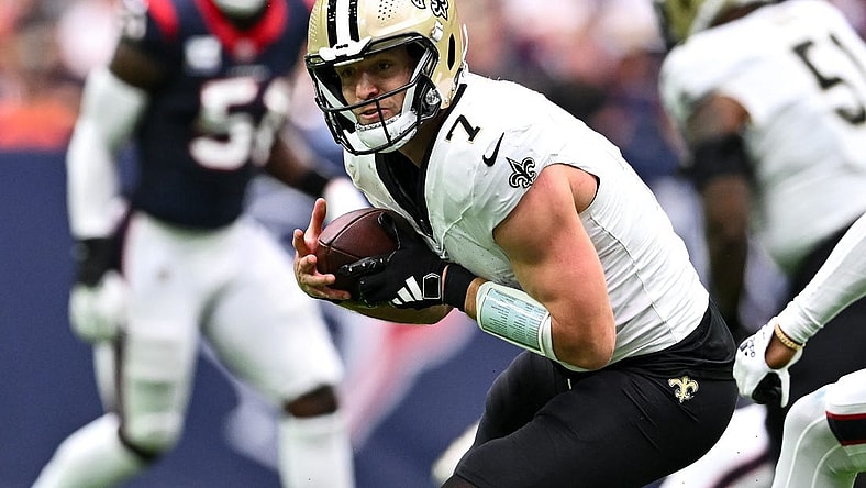 Oct 15, 2023; Houston, Texas, USA; New Orleans Saints quarterback Taysom Hill (7) catches a pass during the second quarter against the Houston Texans at NRG Stadium. Mandatory Credit: Maria Lysaker-USA TODAY Sports